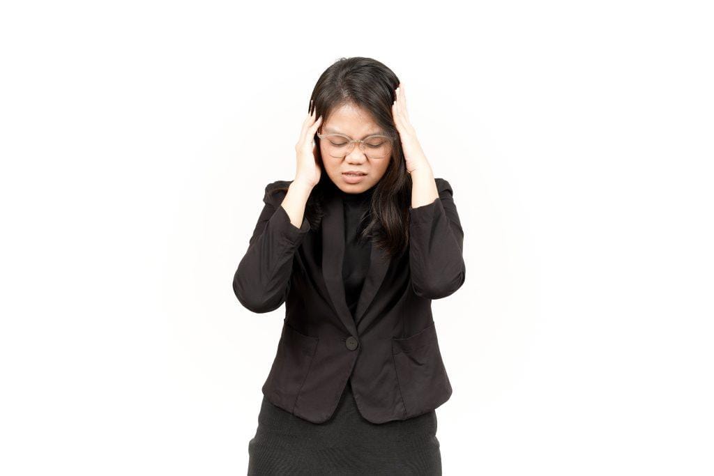 asian woman having a headache