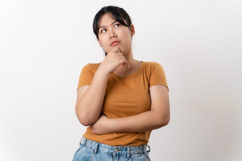 woman thinking about taking genetic testing in inHarmony Clinic